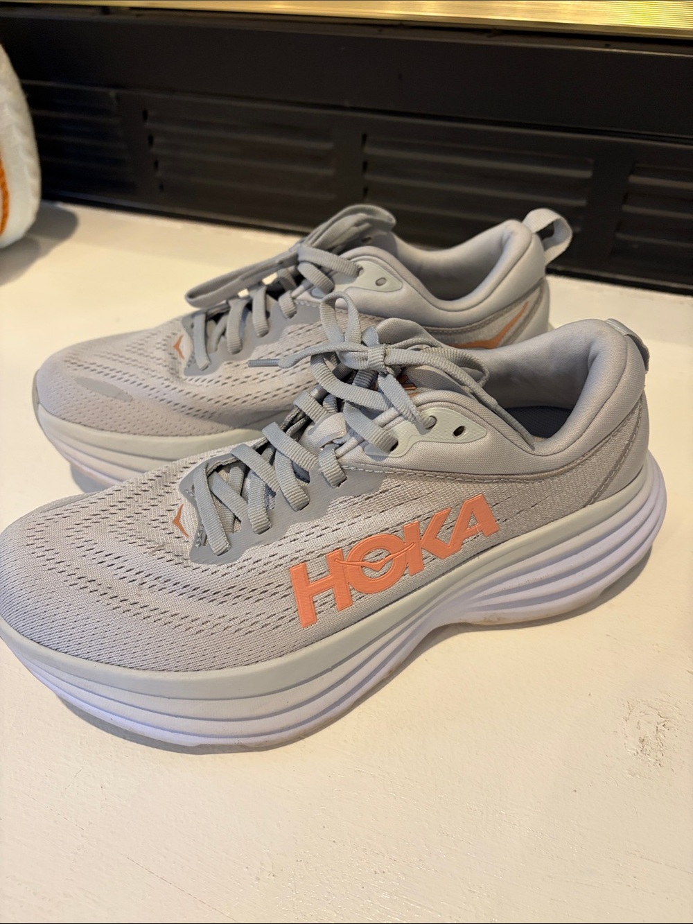 Hoka Women's Light Gray Running Sneakers with Coral Logo